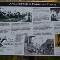 Plaque on the Centennial trail in Arlington commemorating farming